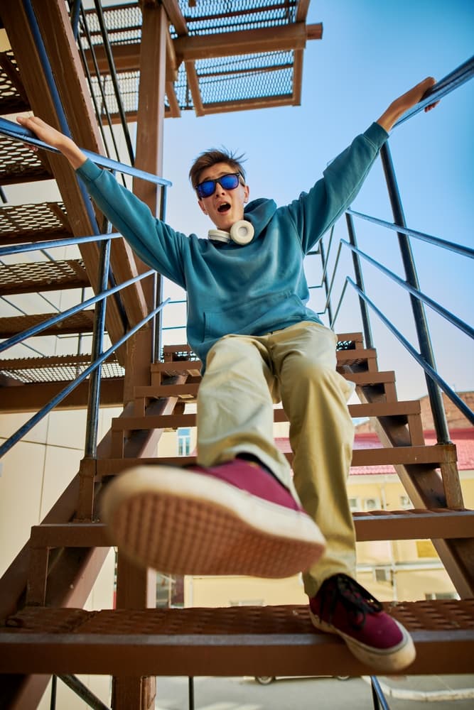 boy falling from stairs