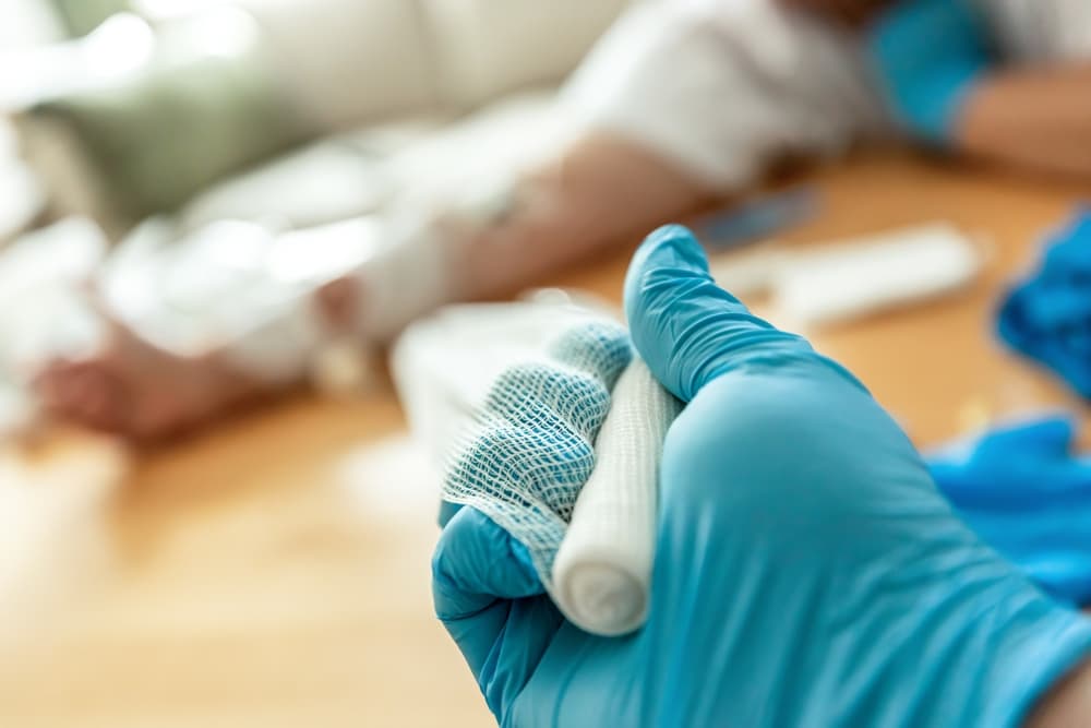 Wound care concept: Representing the cleaning and dressing of a realistic simulated wound to demonstrate proper treatment procedures.