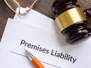 Documents on premises liability accompanied by a pen.
