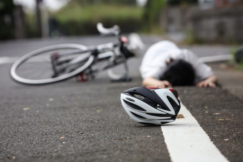 Personal bicycle accident image involving traffic.