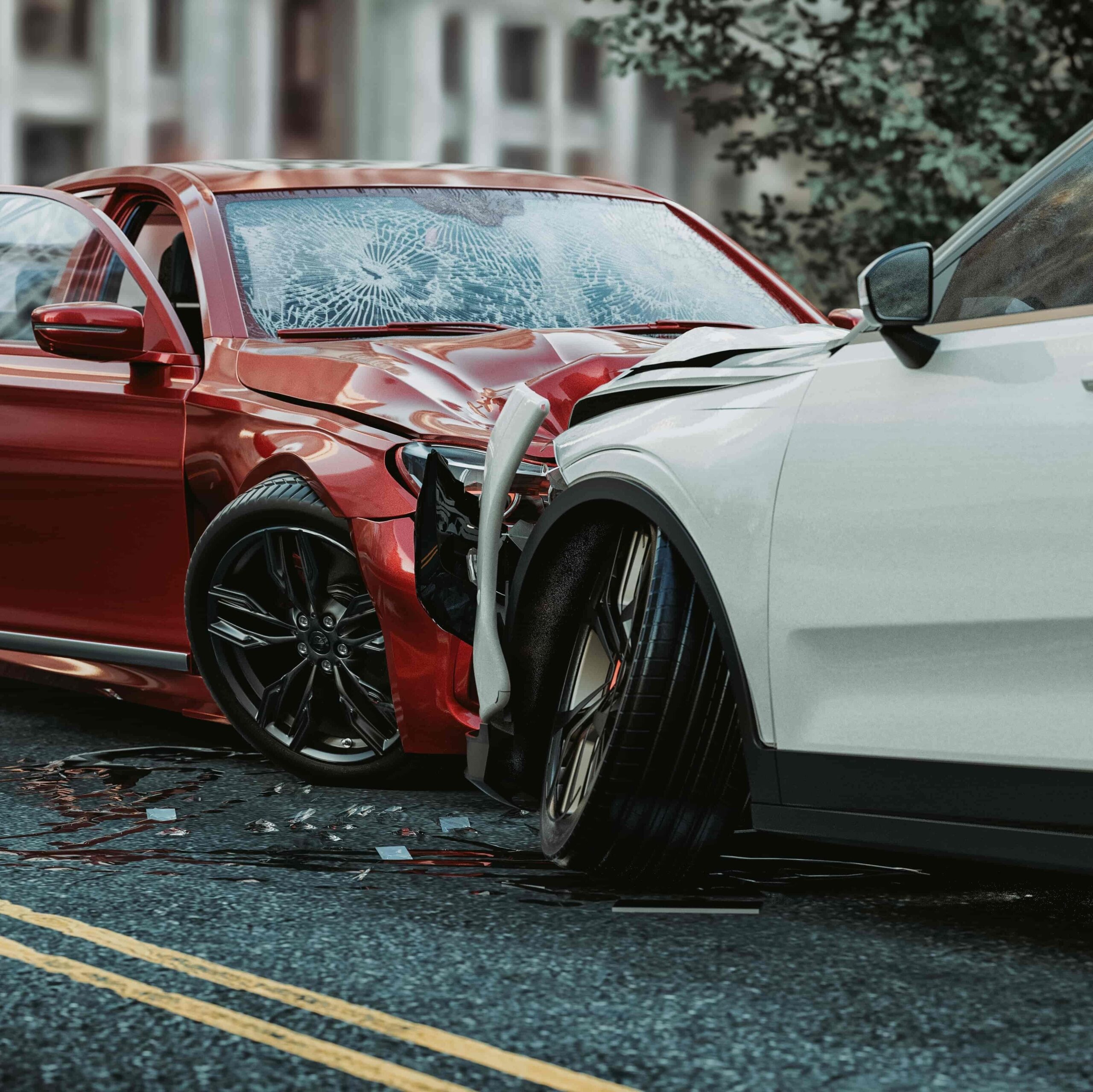 Two cars involved in a severe traffic accident with front-end damage on an urban street.